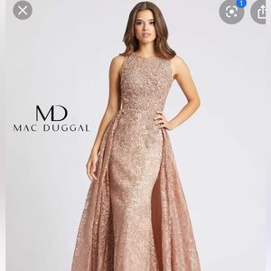 This Rose gold couture Mac Dugal is stunning. A line with attached train.